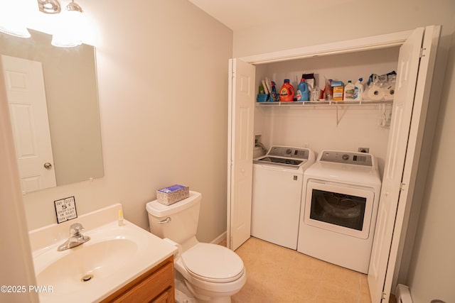 92 Thornwood Ter, Lake Ariel, PA 18436 - bathroom with toilet, vanity, and washer and dryer