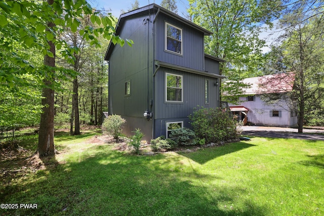 146 Country Club Dr, Thornhurst, PA 18424 - back of house with a lawn