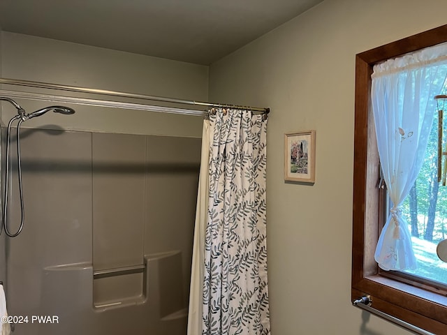 bathroom featuring walk in shower