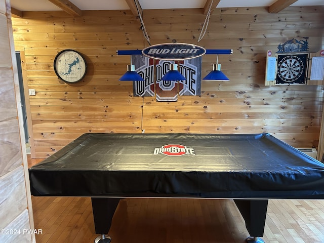 rec room featuring beamed ceiling, wooden walls, and billiards