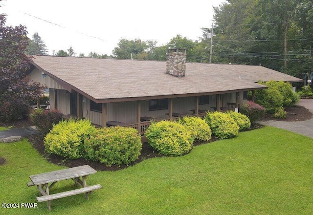 exterior space with a lawn