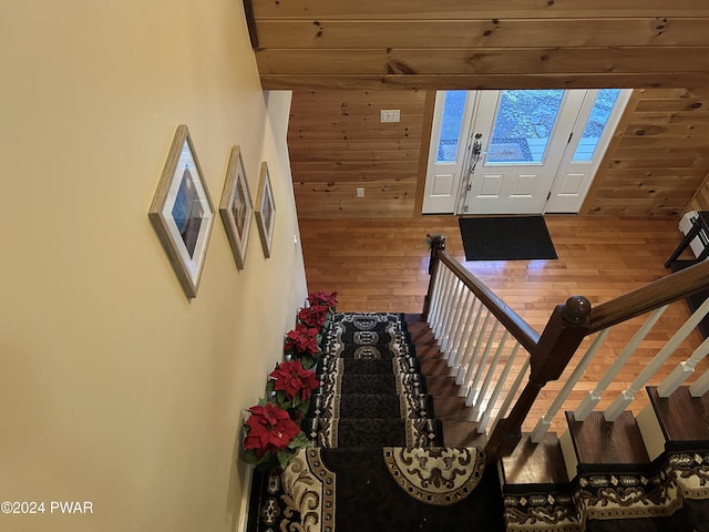 stairs with wood walls