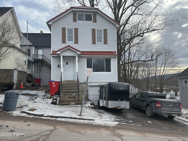 view of front of house featuring metal roof