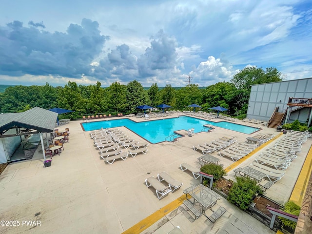 pool with a patio area