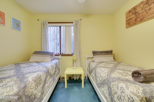 bedroom with carpet and baseboards