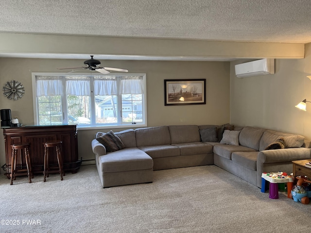 living area with a bar, an AC wall unit, carpet floors, and a textured ceiling