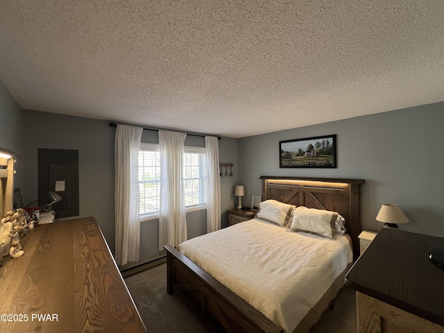 carpeted bedroom with a textured ceiling