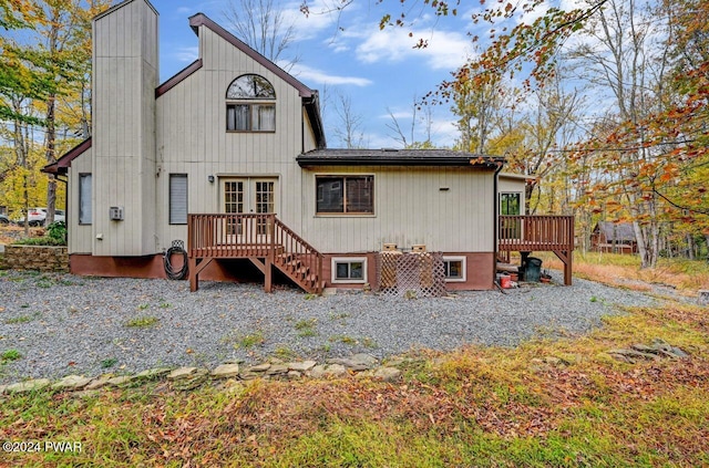 rear view of property with a deck