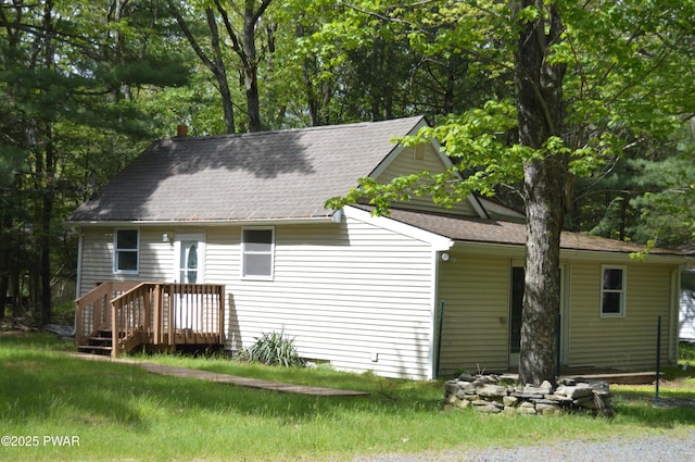 140 Algonquin Rd, Shohola, PA 18458 - rear view of property with a shingled roof