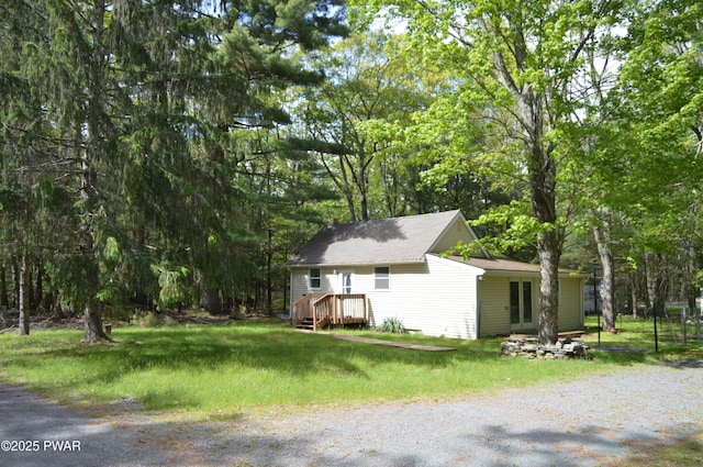 140 Algonquin Rd, Shohola, PA 18458 - view of property exterior with a shingled roof and driveway