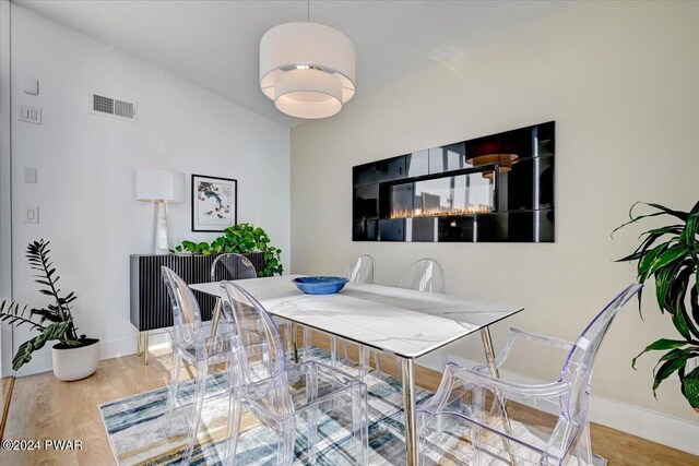 dining room featuring wood-type flooring