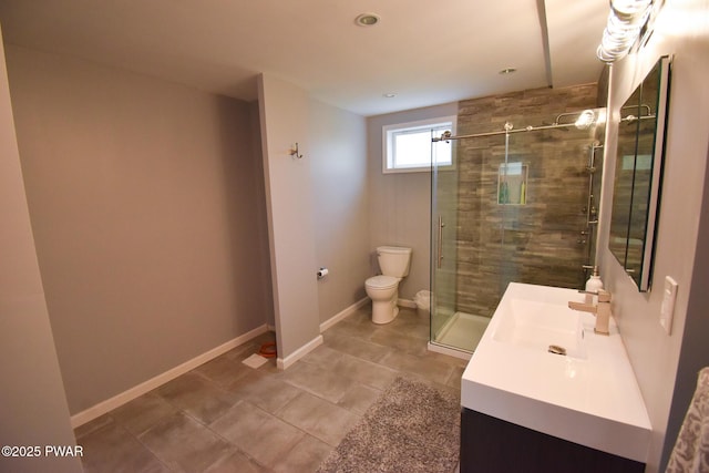 139 Westwood Dr, Dingmans Ferry, PA 18328 - full bath featuring toilet, vanity, a shower stall, tile patterned flooring, and baseboards