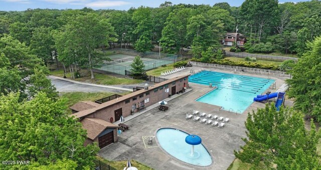 139 Westwood Dr, Dingmans Ferry, PA 18328 - community pool featuring a forest view