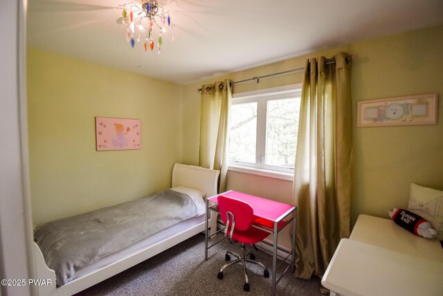 139 Westwood Dr, Dingmans Ferry, PA 18328 - carpeted bedroom with a chandelier