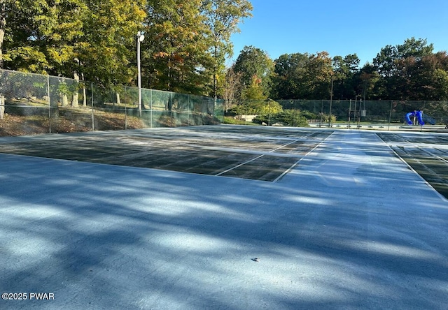 139 Westwood Dr, Dingmans Ferry, PA 18328 - view of tennis court with view of scattered trees