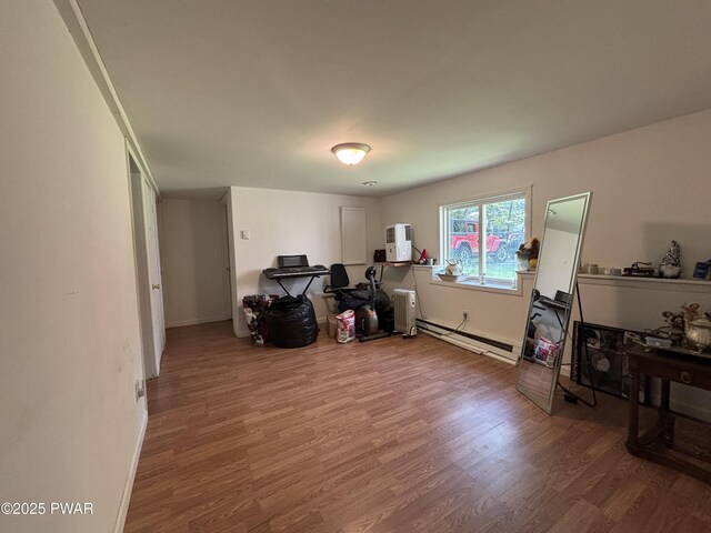 130 Roundhill Rd, Dingmans Ferry, PA 18328 - interior space featuring a baseboard radiator, wood finished floors, and radiator