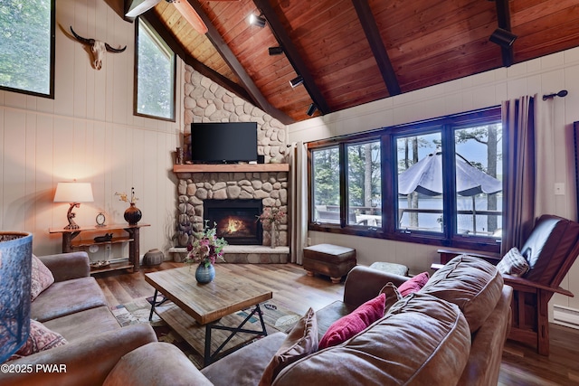 102 Lake Run, Greentown, PA 18426 - living area with wood ceiling, plenty of natural light, wood finished floors, and a fireplace