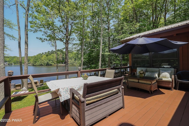 102 Lake Run, Greentown, PA 18426 - wooden deck featuring a water view, outdoor dining space, and an outdoor hangout area