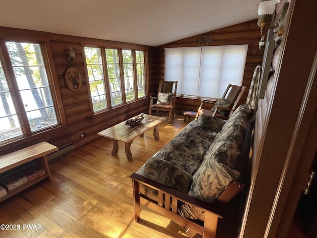 22 Glen Rd, Lake Ariel, PA 18436 - living area with log walls, vaulted ceiling, and light wood-style floors