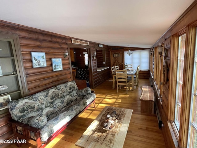 22 Glen Rd, Lake Ariel, PA 18436 - living area featuring rustic walls, plenty of natural light, and wood finished floors