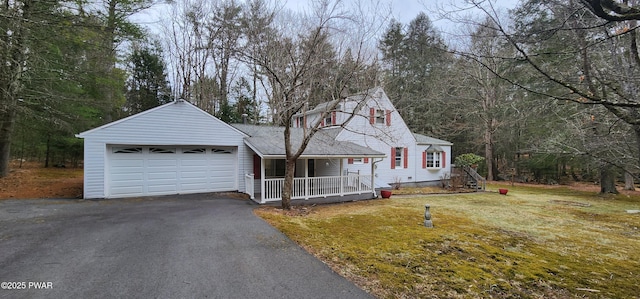640 Rte 434, Shohola, PA 18458 - view of front of property with a garage, a porch, driveway, a front yard, and a shingled roof