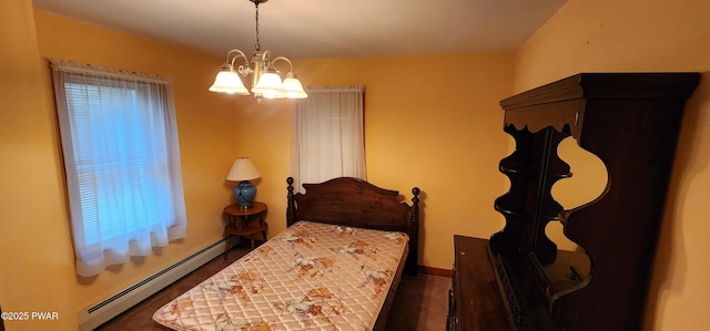 640 Rte 434, Shohola, PA 18458 - bedroom featuring a baseboard radiator and a chandelier