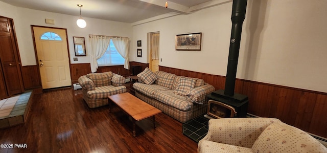 640 Rte 434, Shohola, PA 18458 - living room with a wainscoted wall, a wood stove, wood walls, wood finished floors, and baseboard heating