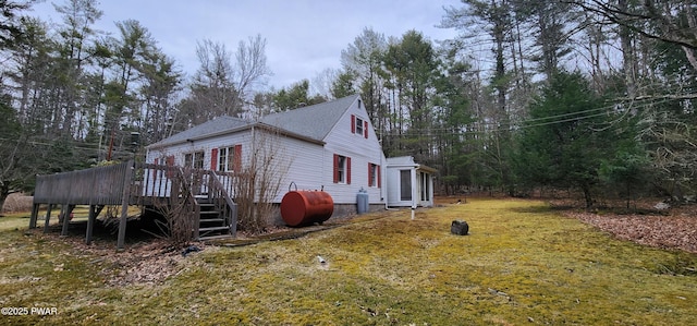 640 Rte 434, Shohola, PA 18458 - view of side of home featuring a deck, oil tank, a yard, and view of scattered trees