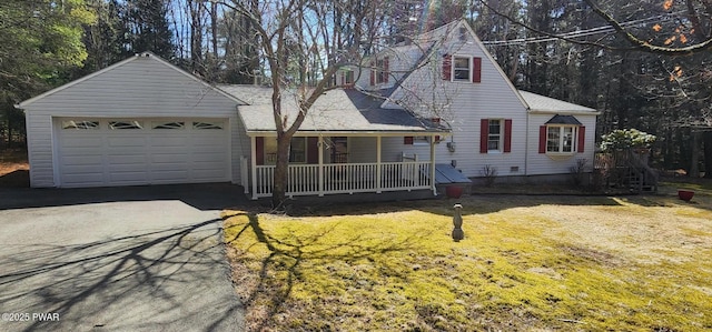 640 Rte 434, Shohola, PA 18458 - view of front facade with covered porch, driveway, a front yard, and a garage