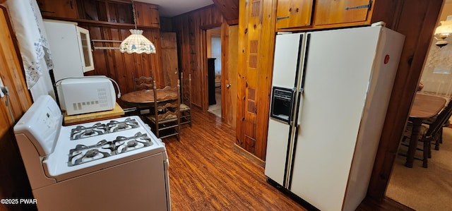 640 Rte 434, Shohola, PA 18458 - kitchen featuring white appliances, brown cabinets, dark wood-type flooring, and wood walls