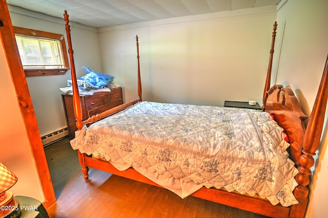 1350 Rt 390, Greentown, PA 18426 - bedroom featuring a baseboard heating unit and wood-type flooring