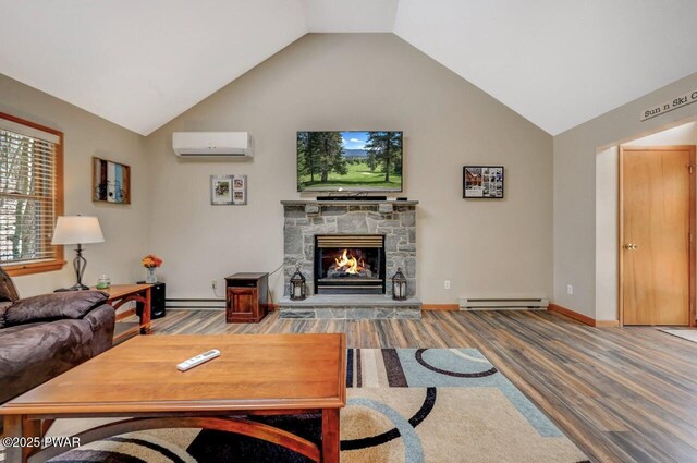 98 Roamingwood Rd, Lake Ariel, PA 18436 - living area featuring baseboard heating, wood finished floors, a wall mounted AC, a fireplace, and lofted ceiling