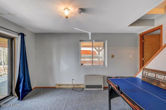 98 Roamingwood Rd, Lake Ariel, PA 18436 - game room with a baseboard heating unit, carpet floors, a healthy amount of sunlight, and baseboards