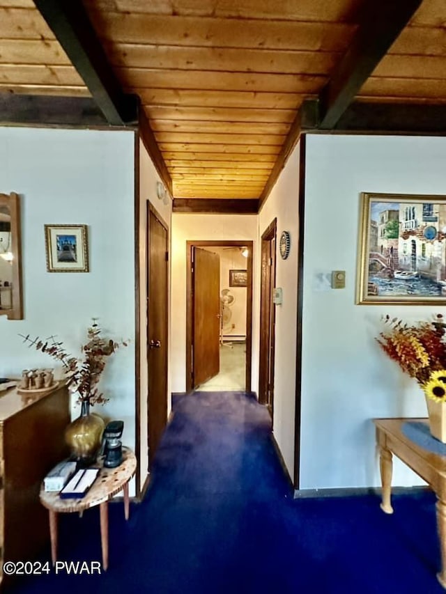 corridor featuring beamed ceiling and wood ceiling