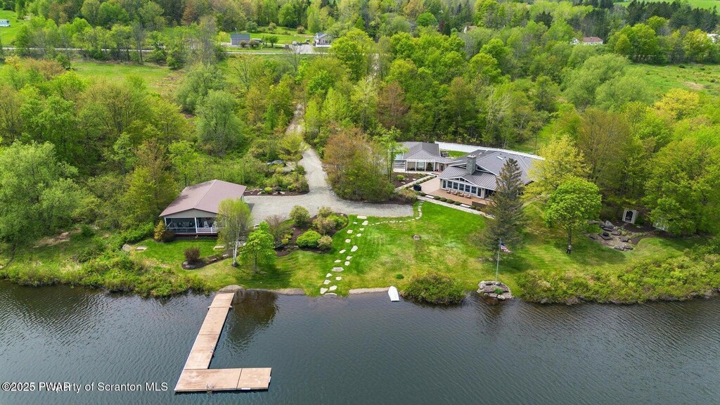 19600 State Route 92, Susquehanna, PA 18847 - aerial overview of property's location with a nearby body of water and a heavily wooded area