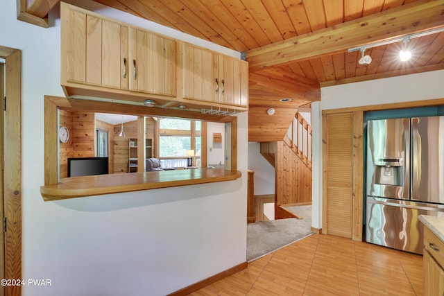 10 Cove Point Cir, Lakeville, PA 18438 - kitchen with stainless steel fridge with ice dispenser, light brown cabinetry, a wood ceiling with exposed beams, light wood-type flooring, and wooden walls