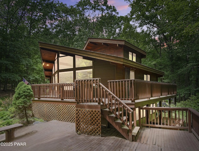 10 Cove Point Cir, Lakeville, PA 18438 - view of front facade featuring a wooden deck and stairway