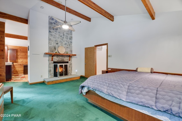 10 Cove Point Cir, Lakeville, PA 18438 - bedroom with carpet, beam ceiling, a high ceiling, and a stone fireplace