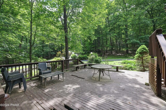 10 Cove Point Cir, Lakeville, PA 18438 - wooden deck with a wooded view