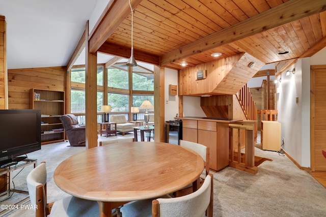 10 Cove Point Cir, Lakeville, PA 18438 - dining space with wood walls, light colored carpet, wine cooler, and wood ceiling