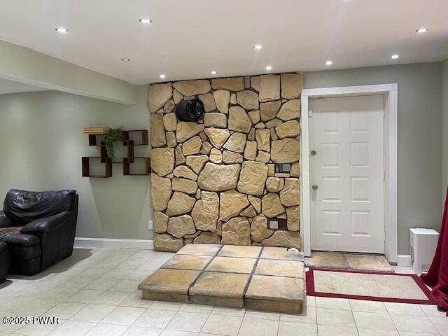 interior space featuring tile patterned flooring and recessed lighting