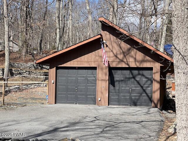 detached garage with fence