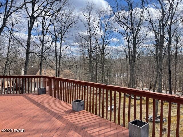 deck with a forest view