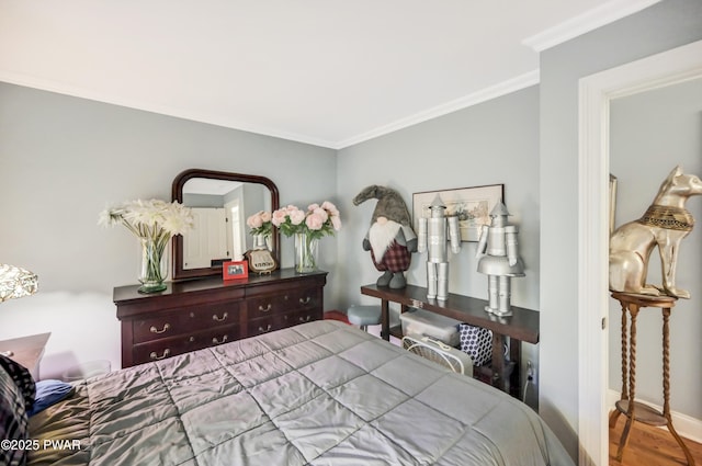 136 Weasel Rd, Dingmans Ferry, PA 18328 - bedroom featuring ornamental molding and wood finished floors