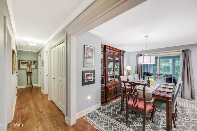 136 Weasel Rd, Dingmans Ferry, PA 18328 - dining room featuring attic access, crown molding, and wood finished floors