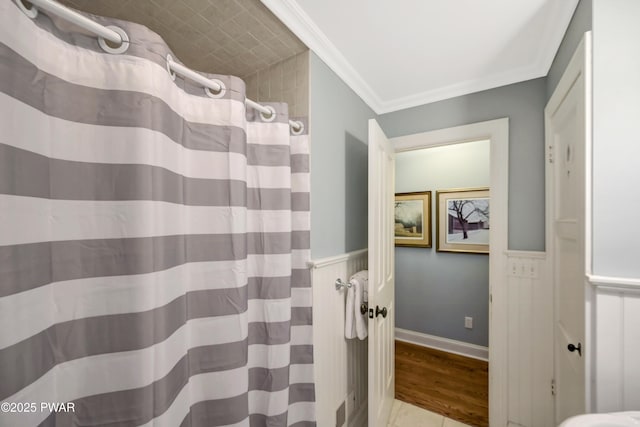 136 Weasel Rd, Dingmans Ferry, PA 18328 - bathroom with crown molding, a wainscoted wall, and a shower with curtain