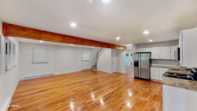 152 Fairview Dr, Dingmans Ferry, PA 18328 - kitchen featuring appliances with stainless steel finishes, a baseboard radiator, light wood-style flooring, recessed lighting, and white cabinets