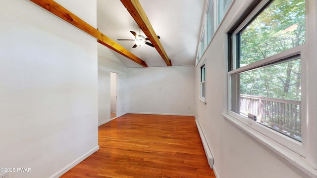 152 Fairview Dr, Dingmans Ferry, PA 18328 - hallway featuring beamed ceiling, healthy amount of natural light, wood finished floors, baseboards, and a baseboard heating unit