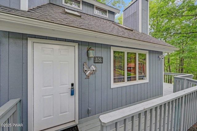 108 Minnow Ct, Lackawaxen, PA 18435 - doorway to property with roof with shingles and a chimney