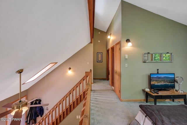 108 Minnow Ct, Lackawaxen, PA 18435 - corridor with a skylight, light colored carpet, and high vaulted ceiling